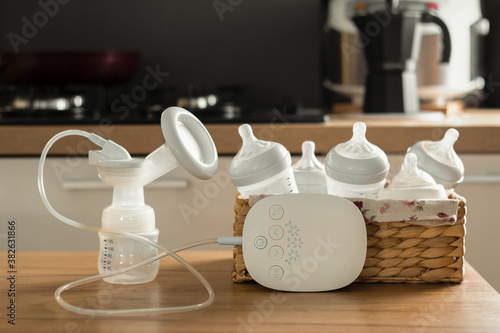 Electric breast pump and bottles