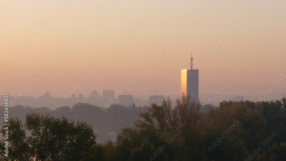  Sunrise Timelape in Belgrade Serbia with the Usce Tower in Foreground. Usce Tower was damaged by NATO air-strikes in 1999 bombing of Yugoslavia.