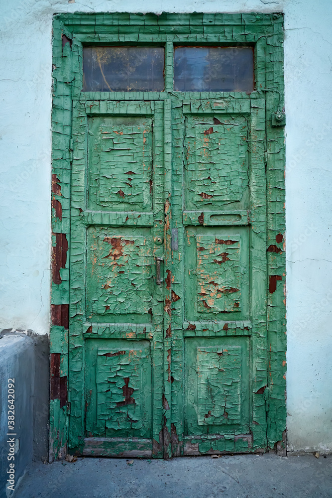 Оld typical vintage wooden door