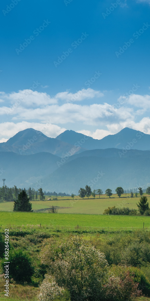 Breathtaking Tatra Mountains and green meadows of Slovakia