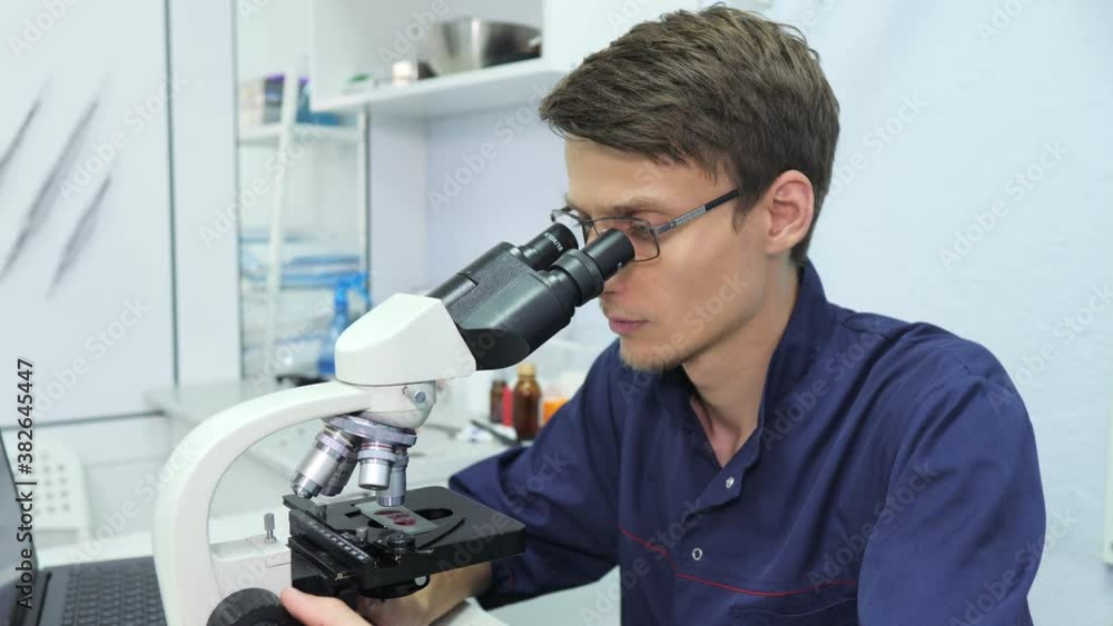 Scientist in lab analysis of new corona virus, a sample of the blood in laboratory. Covid-19 concept Scientist in lab analysis of new corona virus, a sample of the blood in laboratory. Covid-19 concept