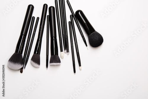 Makeup brushes on white background