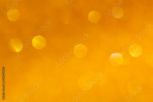 blured golden glitter texture abstract background
