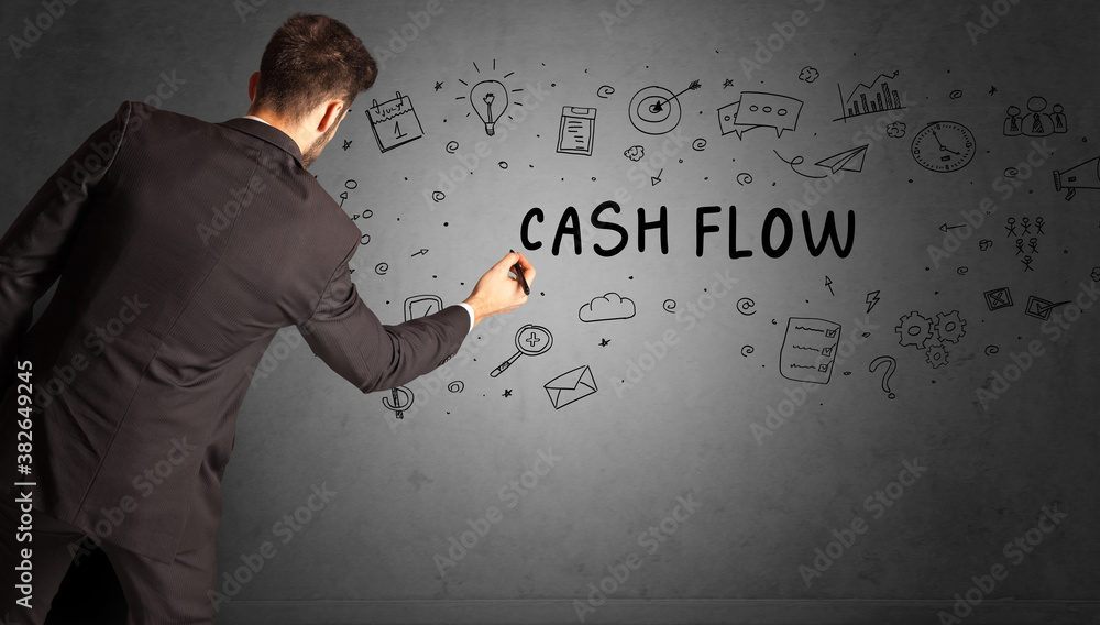 businessman drawing a creative idea sketch with CASH FLOW inscription, business strategy concept businessman drawing a creative idea sketch with CASH FLOW inscription, business strategy concept