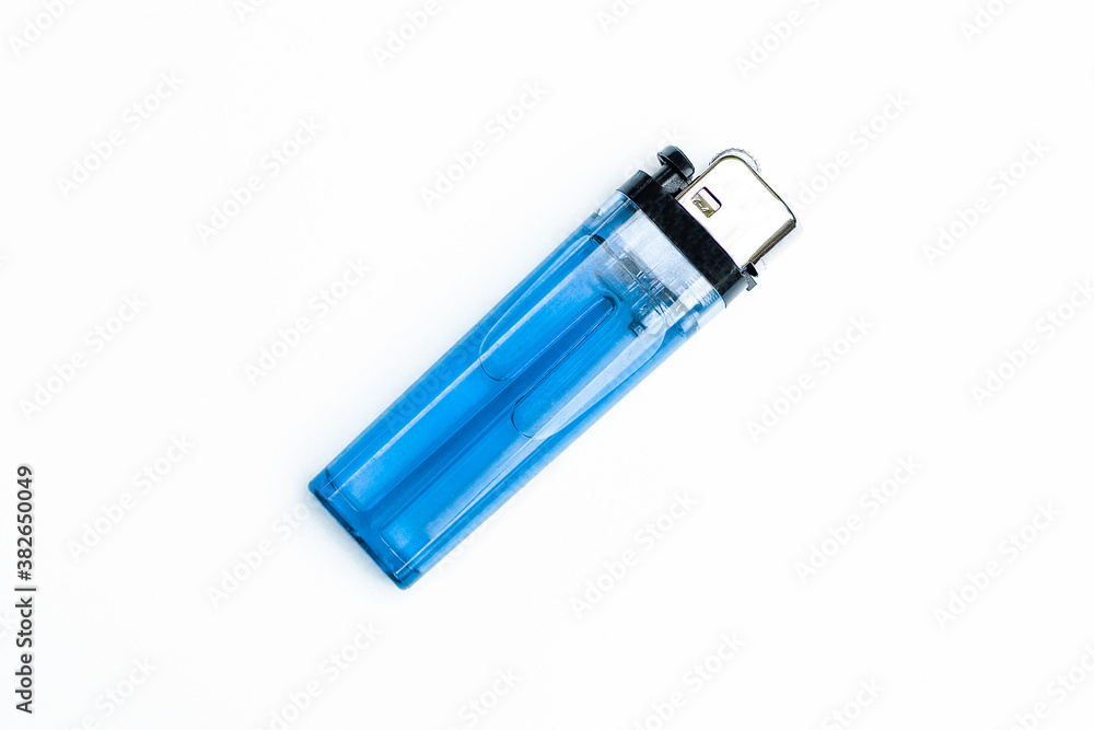 Blue plastic lighters on white background top view. Blue plastic lighters on white background top view.