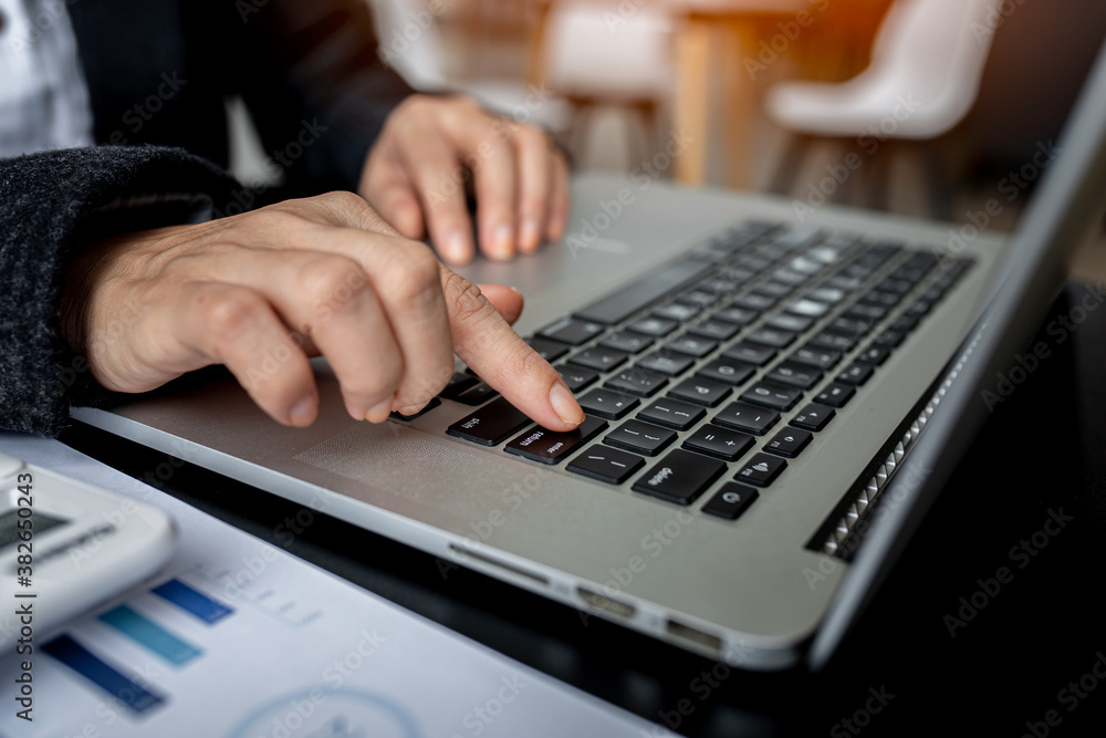 Financial Businesswomen analyze the graph of the company's performance to create profits and growth, Market research reports and income statistics, Financial and Accounting concept. Financial Businesswomen analyze the graph of the company's performance to create profits and growth, Market research reports and income statistics, Financial and Accounting concept.