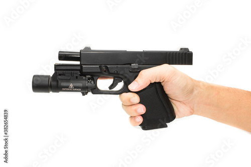 Shooter hand grab on G19 Gen 4th Semi-Auto Pistol attach flashlight, Shooting the 9 mm pistol cartridge.