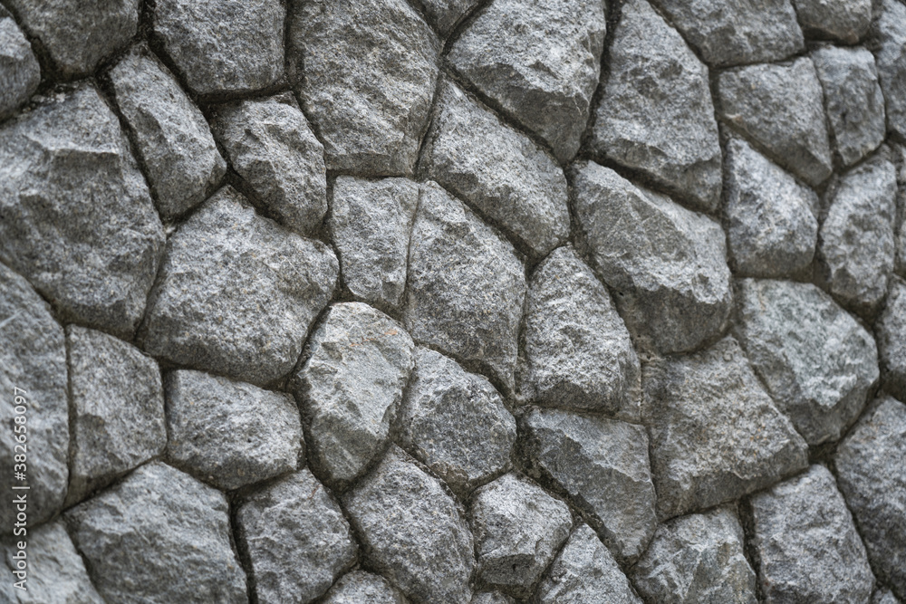 Cobblestone / Rock material background, texture or wallpaper photo.