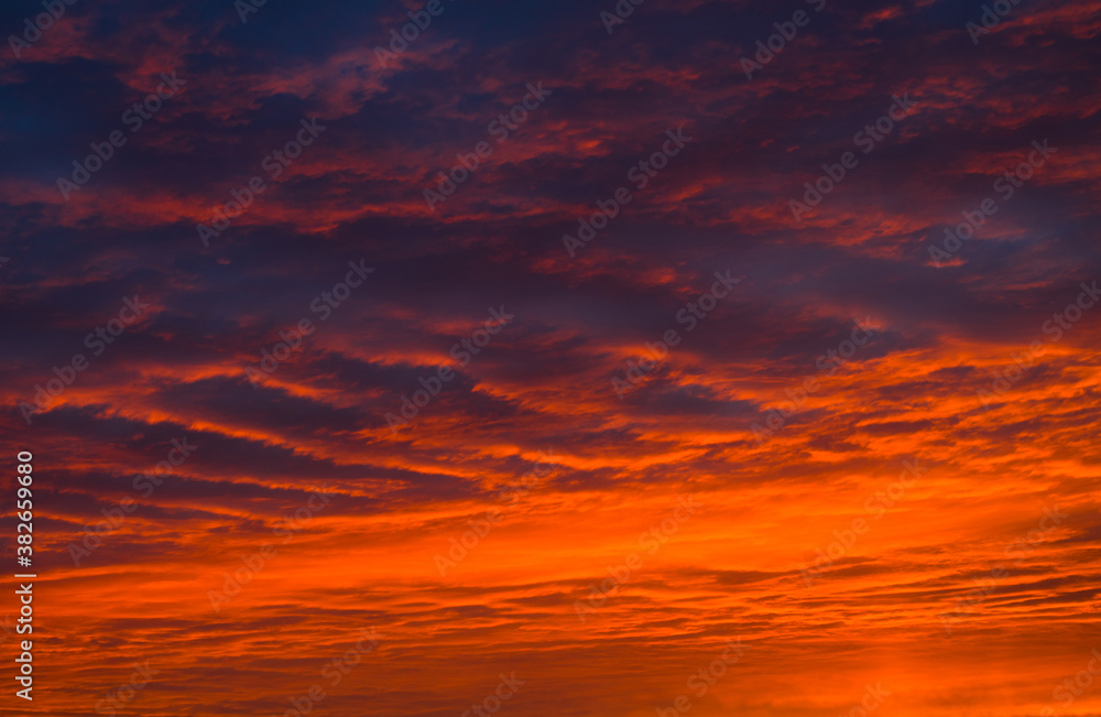 Orange clouds in the sunset sky