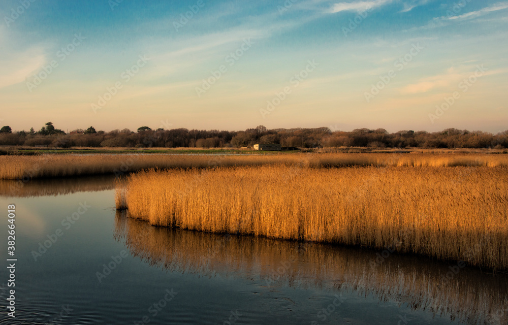 The river Meon running through Titchfield Haven on a sunny winter's afternoon.