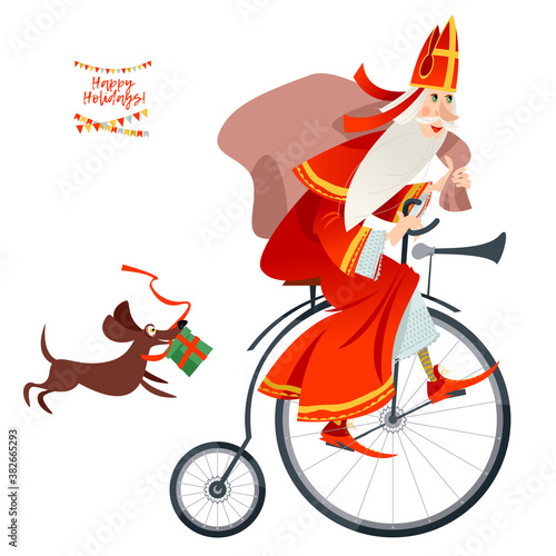 Santa Claus (Sinterklaas) on a vintage bicycle with a bag of gifts. Christmas in Holland.