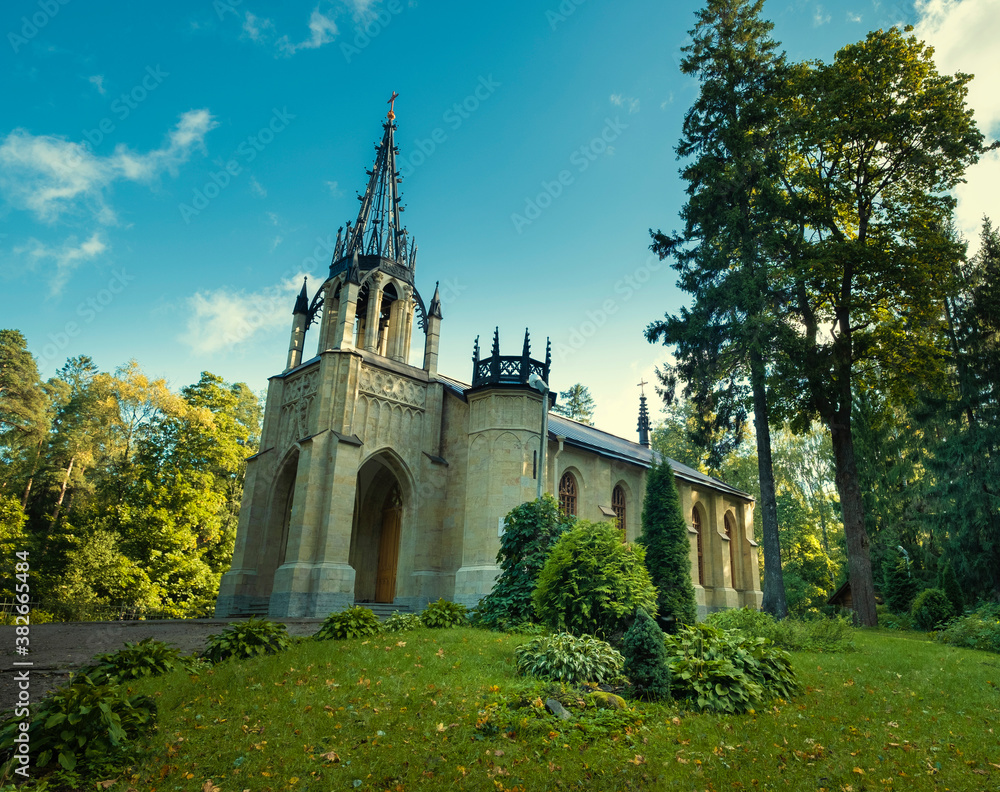 Ancient Church of Peter and Paul in Gothic style in Shuvalovsky Park in the city of St. Petersburg Russia