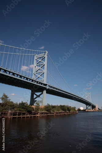 View of suspension The Benjamin Franklin Bridge crossing the Delaware River connecting Camden New Jersey from Philadelphia, Pennsylvania, USA