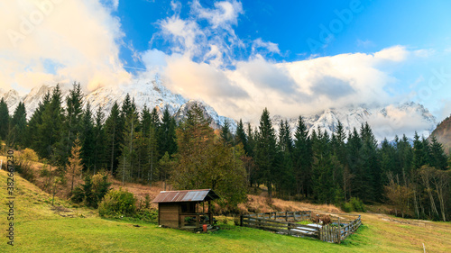 autumn sunrise in the alpine valley