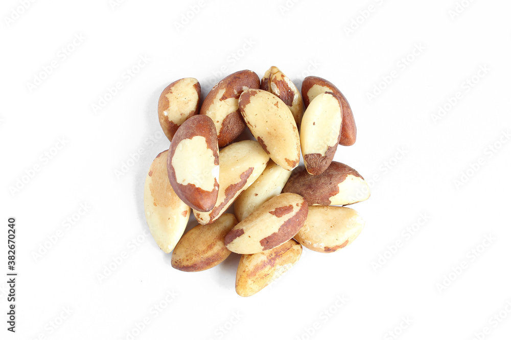 Pile of brazil nuts isolated on white background. Delicious treat delicacy Pile of brazil nuts isolated on white background. Delicious treat delicacy