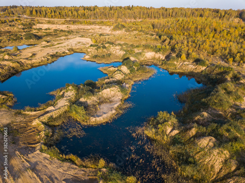 Flooded overgrown sand pit near Sychevo Moscow region. Russia.
