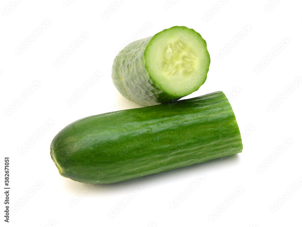 Cucumber and slices isolated over white background. Cucumber and slices isolated over white background.