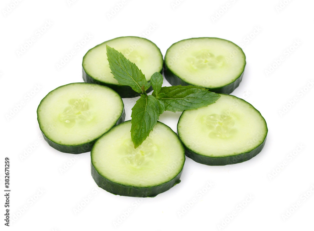 Cucumber and slices isolated over white background. Cucumber and slices isolated over white background.