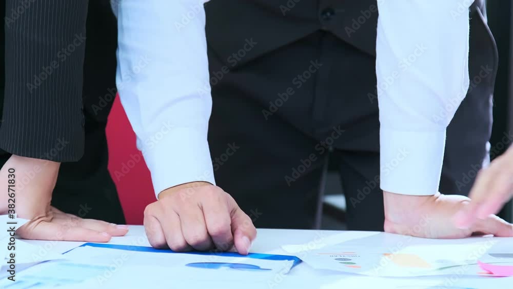 close up Business person reviewing Charts document for business project oworkers Leaning on it in Collective Leap to Find Problem Solutions close up Business person reviewing Charts document for business project oworkers Leaning on it in Collective Leap to Find Problem Solutions