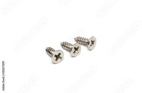 Self Drilling Screw Flat Head isolated on white background © Sutthipan