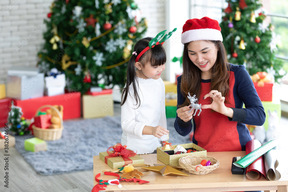mother and daughter feeling happy and enjoy with christmas gift mother and daughter feeling happy and enjoy with christmas gift