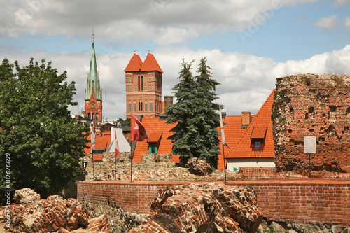 Ruins of castle, church of James Apostle (Sw. Jakuba) and church of St. Catherine in Torun.  Poland photo