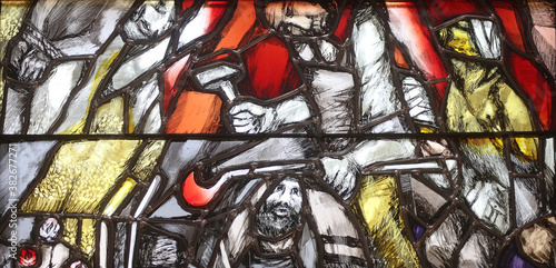 Obraz na plátně God bears the guilt of all mankind, takes hold of sinners and saves them from death, detail of stained glass window by Sieger Koder in St