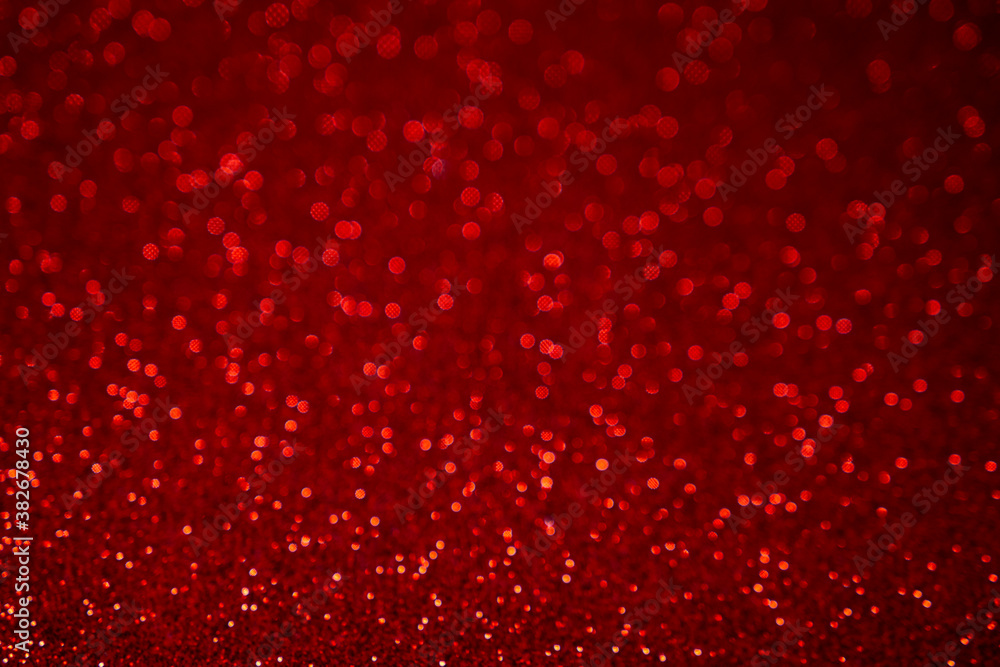 Red glittering bokeh background New Year concept