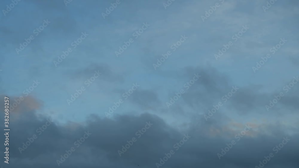 Rain clouds moved by the wind with birds Rain clouds moved by the wind with birds