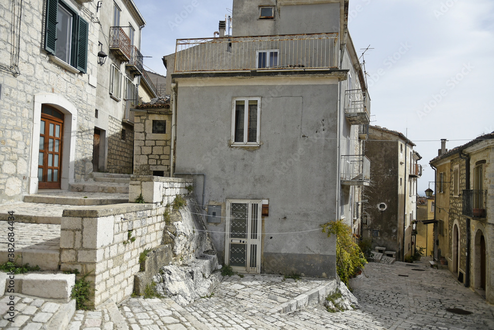 A narrow street among the old houses of Ferrazzano, a medieval village in the Molise region.
