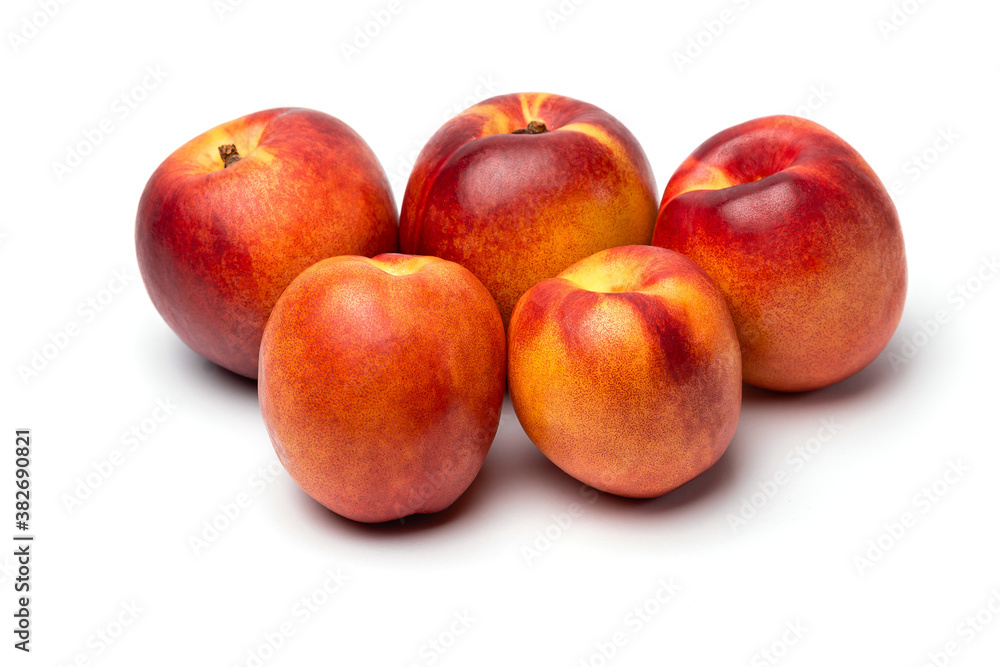 fresh juicy nectarines on a white background fresh juicy nectarines on a white background