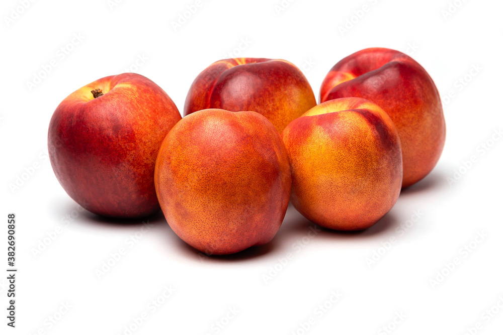 fresh juicy nectarines on a white background fresh juicy nectarines on a white background