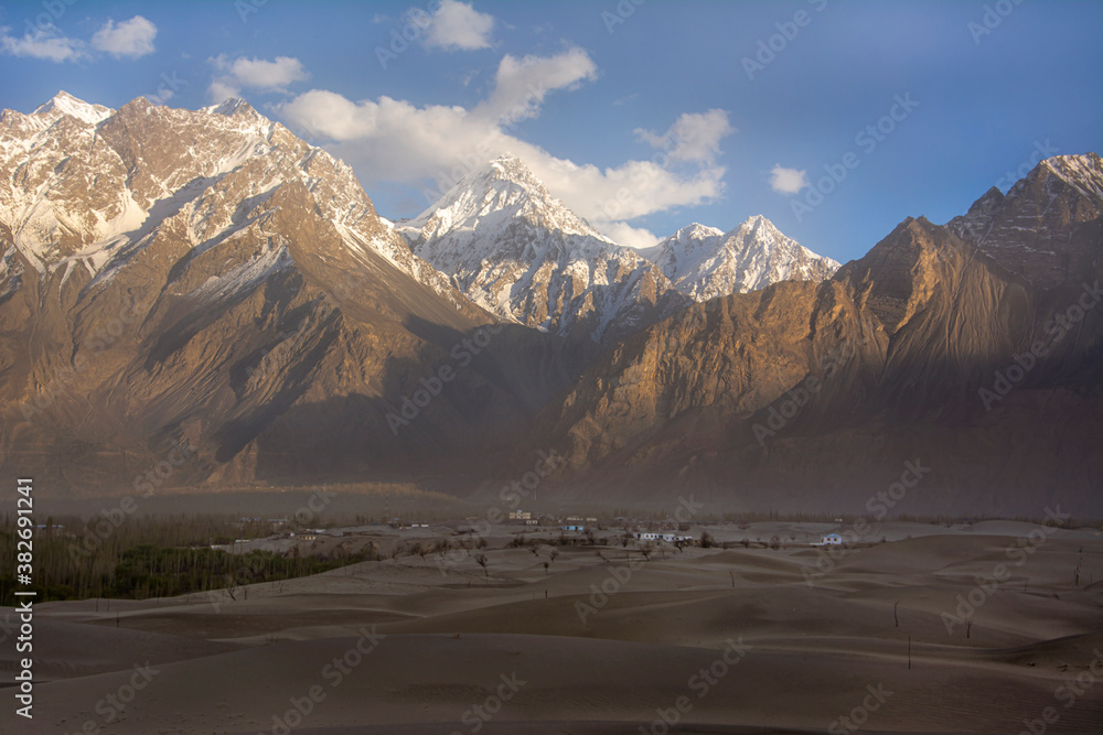 katpana cold desert with snow capped mountains in skardu , gilgit ...