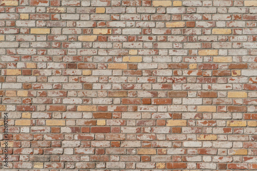 Vintage old brick wall building background texture. Different colors of bricks
