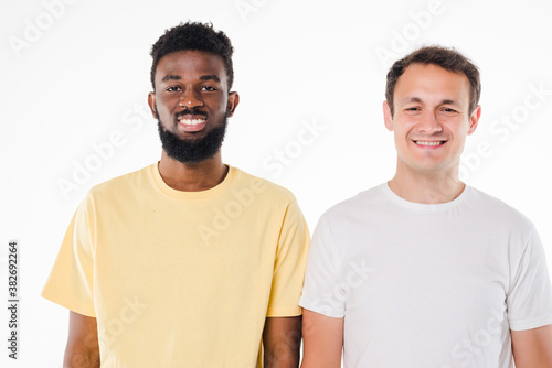 Portrait of a two confident men isolated over white background