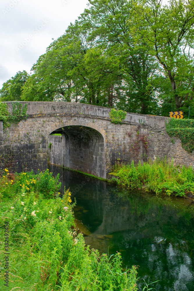 Beautiful ancient stone bridge at Irish Canal Beautiful ancient stone bridge at Irish Canal