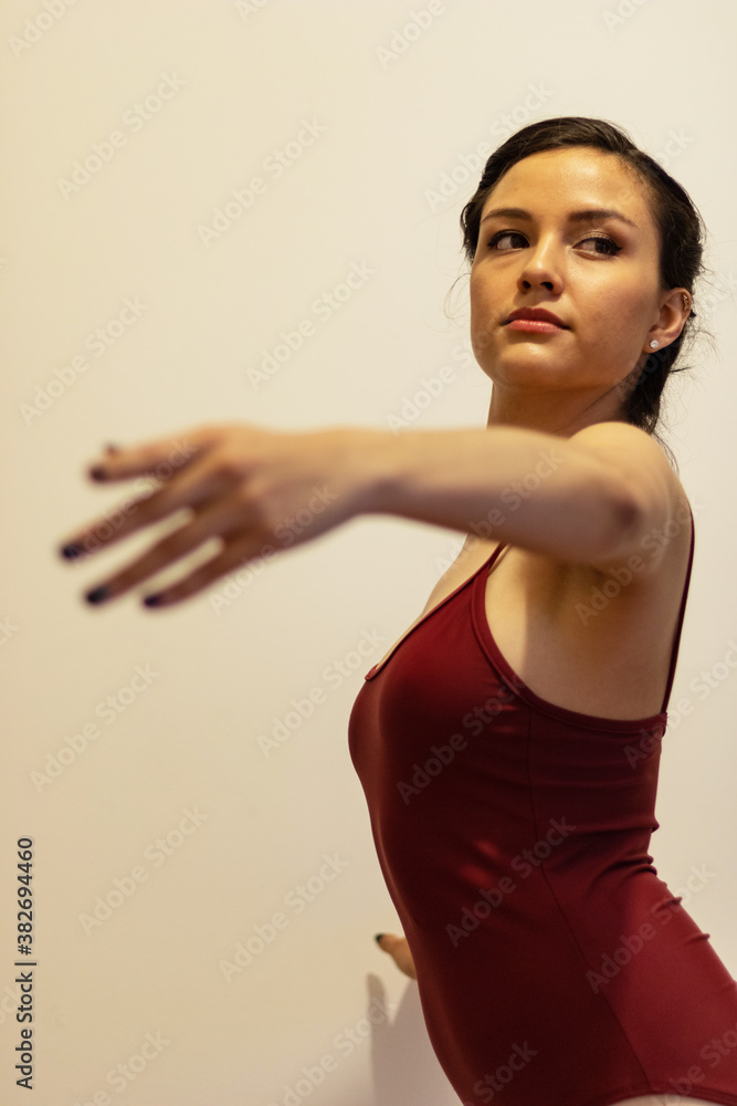 Hispanic/Latin woman dancing at home due to the closure of dance schools due to covid19 Hispanic/Latin woman dancing at home due to the closure of dance schools due to covid19