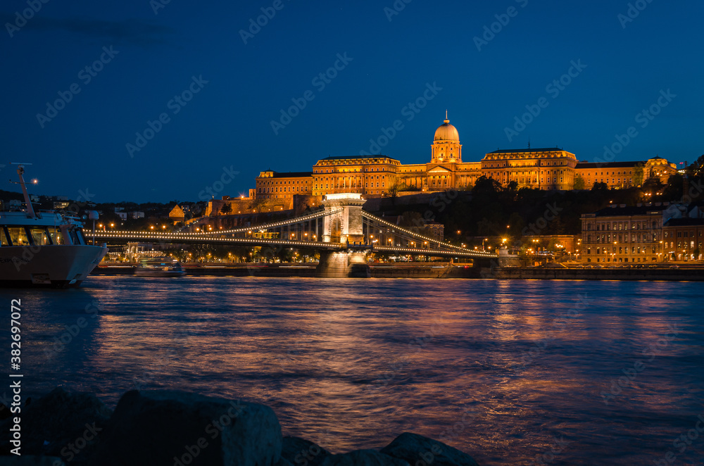 The famous Chain bridge with the castle in the background at night, Budapest, Hungary