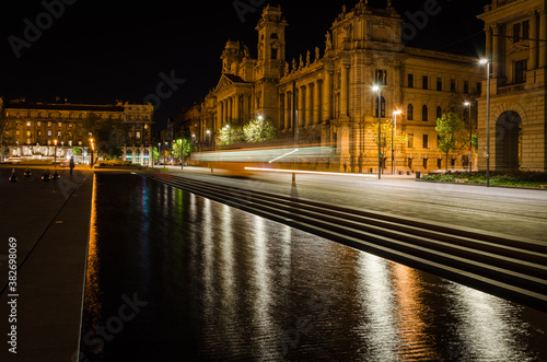 A pond reflects the street lights in Kossuth Lajos square, Budapest, Hungary