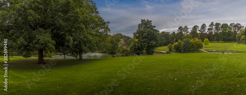 A panorama view towards the lakes in Abington Park, Northampton, UK in the summertime © Nicola