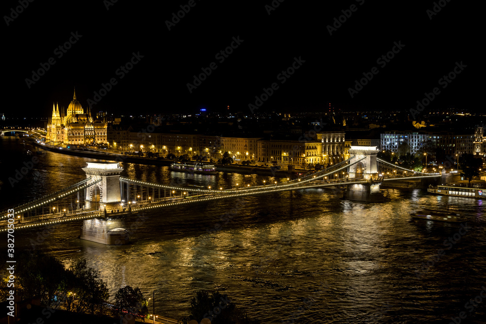 Budapest city landscape with the Chain bridge over the Danube river and the Parliament building at night, Budapest, Hungary