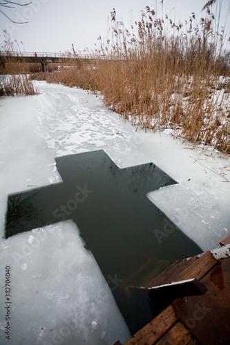 A hole in the ice on the river on the feast of the Epiphany