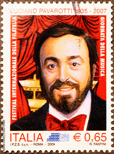 Luciano Pavarotti on italian postage stamp photo