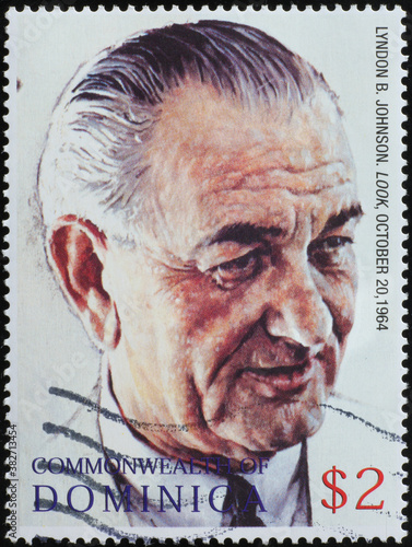 Portrait of President Johnson by Norman Rockwell on stamp photo