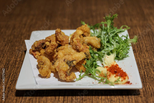 Japanese style, deep fried Squid Tentacles, Kara-age, serve with mayonnaise.