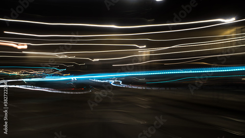 Multicolor light painting Long exposure abstract night curve lights. Light trails at night.