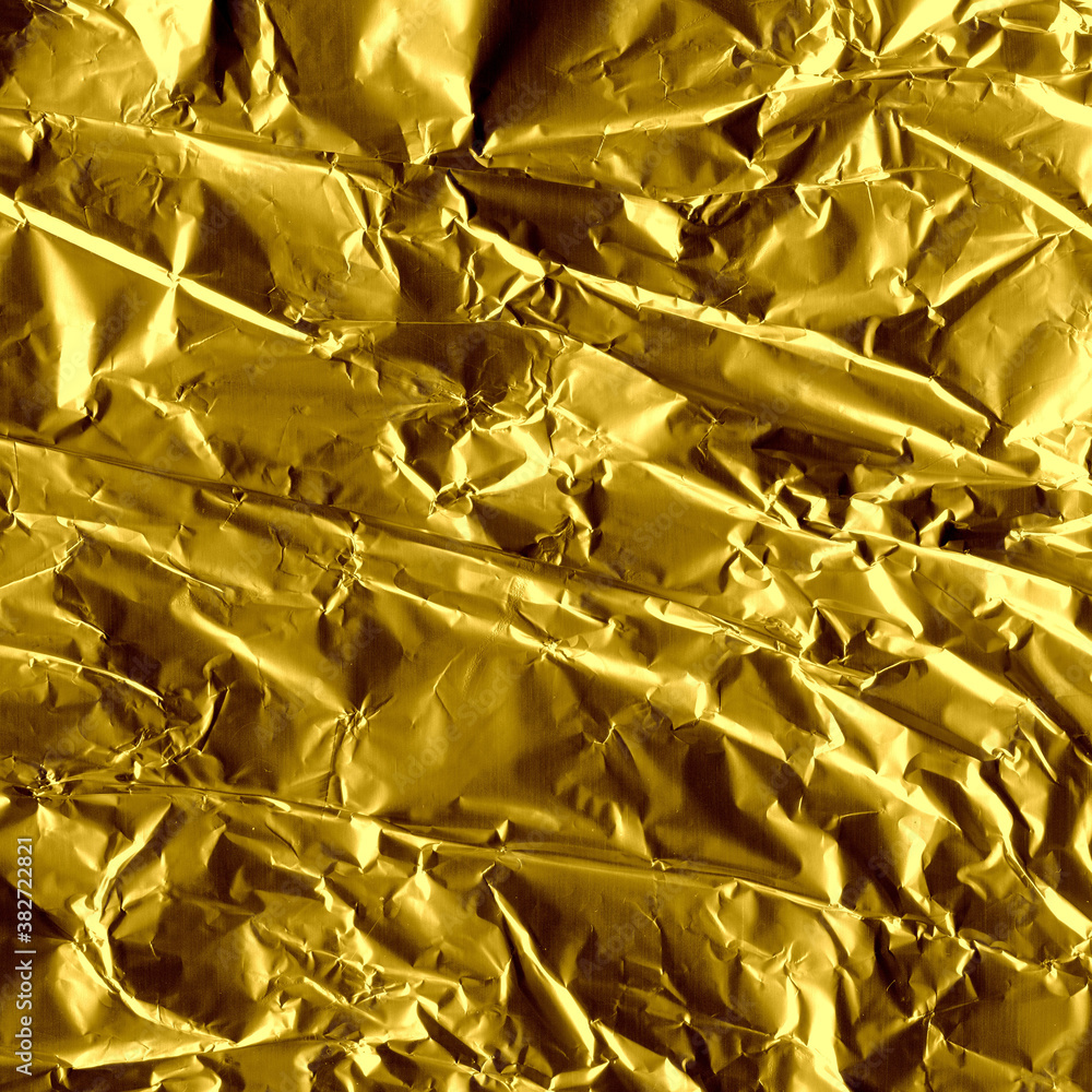 Fototapeta premium Gold shiny wall abstract background. Crumpled luxury metallic foil texture.