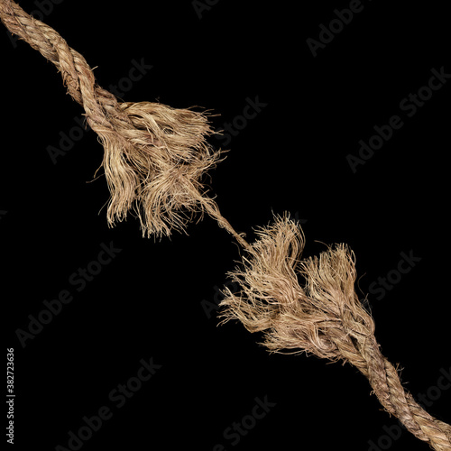 Rope frayed and ready to break apart with rope held together by a last strand ready to snap. Concept of dangerous stress or stressful situation like divorce separation, deadlines, failure, or tension.