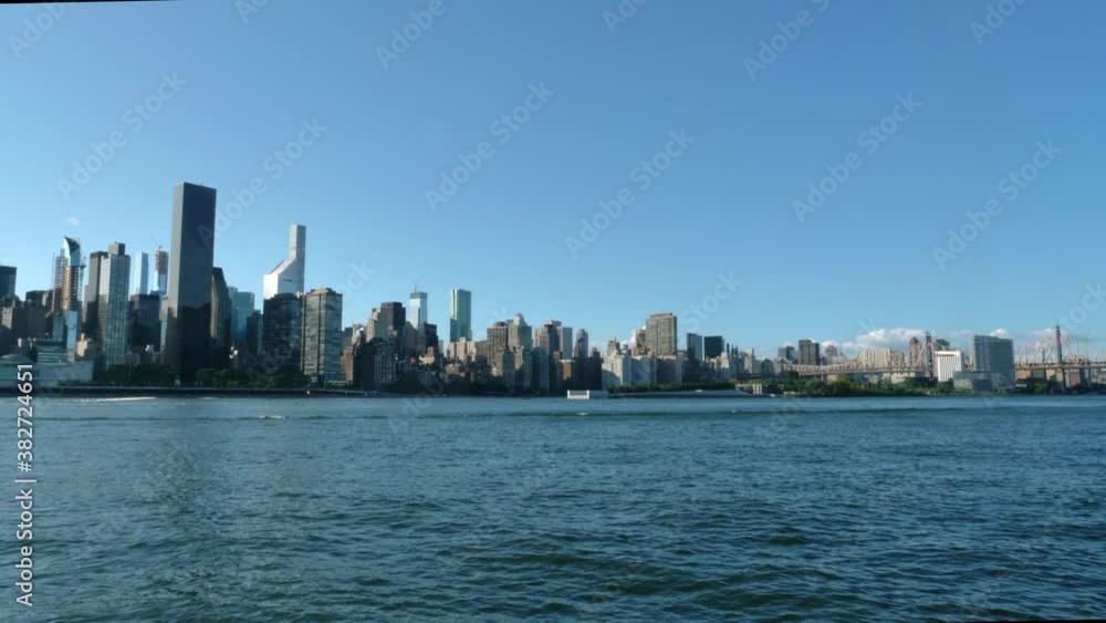 Wide, Manhattan skyline on a clear day, viewed from Long Island City, USA Wide, Manhattan skyline on a clear day, viewed from Long Island City, USA
