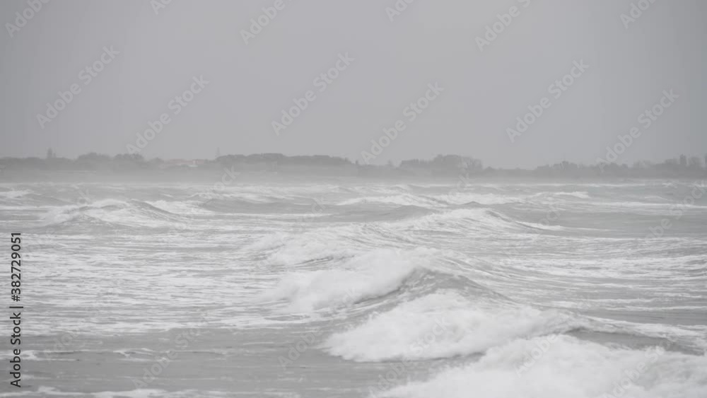 Rough seas with waves crushing on the beach - Venice, Italy Rough seas with waves crushing on the beach - Venice, Italy